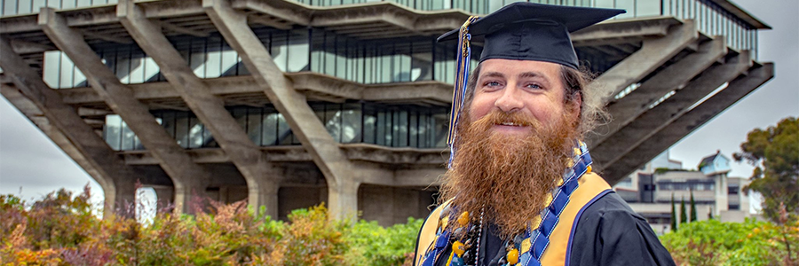 UC San Diego and AEP alumnus Robert Walker in his graduation cap and gown