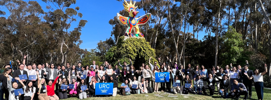 1 of 5, students in front of Sun God